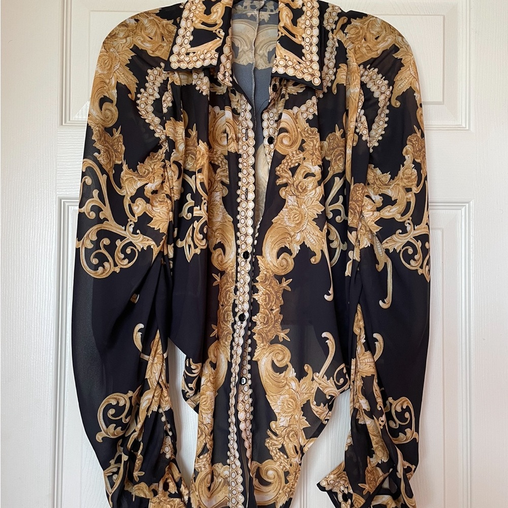 Black/Gold semi sheer crop blouse,button down front with domain sleeves.